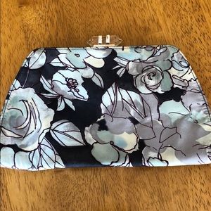 Moving! 📦 Banana Republic flowered clutch